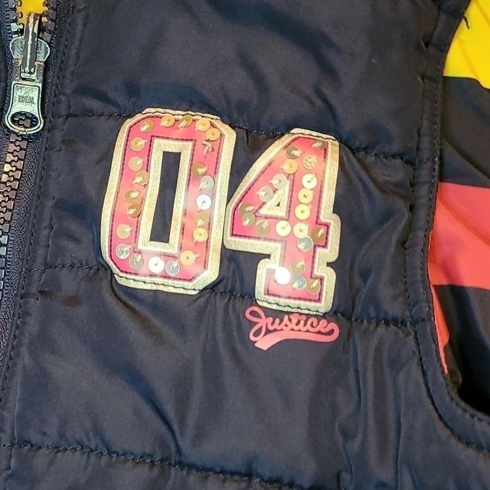 Justice reversible Navy puff vest Size 8